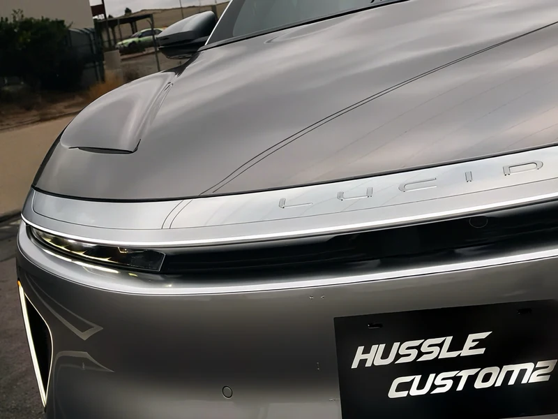 Lucid Air ceramic coated paint detail showing hydrophobic properties