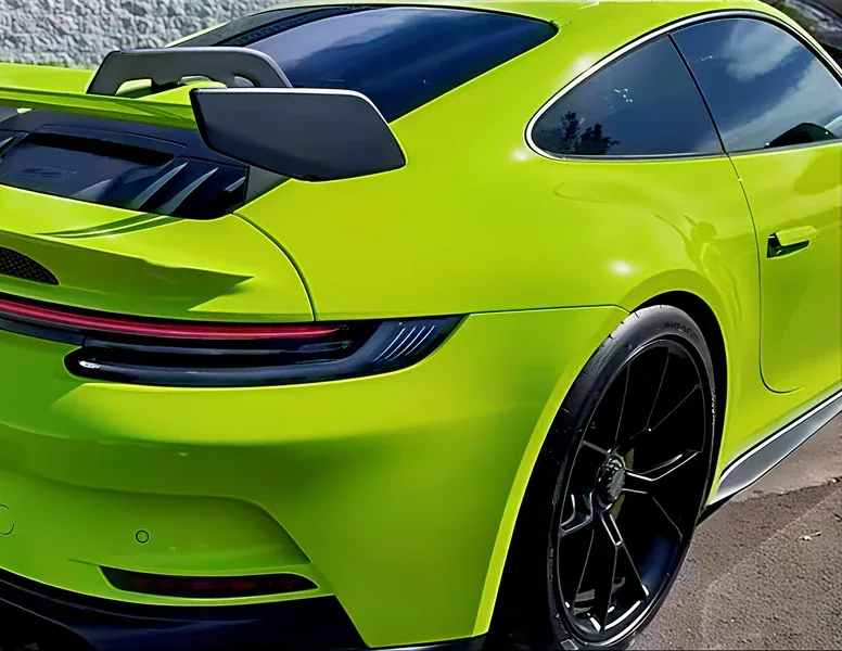 Porsche 911 GT3 with STEK Clear PPF over lime paint at Hussle Customz