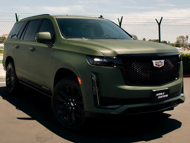 Cadillac Escalade with matte military green vinyl wrap — Los Angeles color change project
