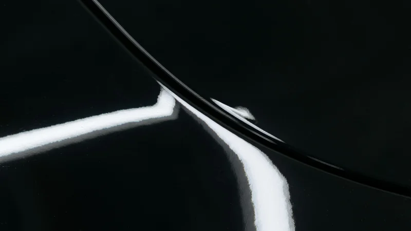 Porsche gloss PPF edge detail — wrapped and sealed edges