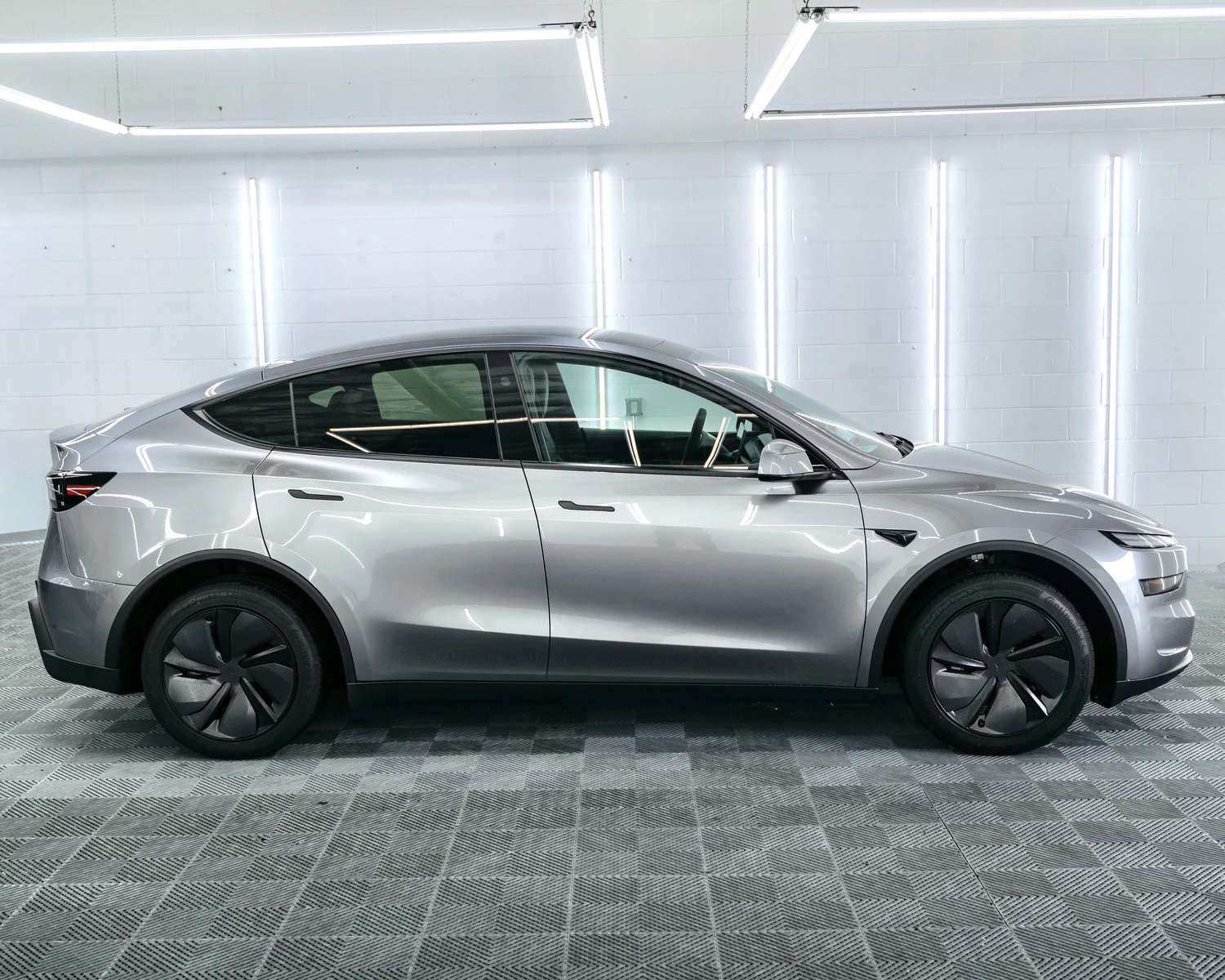 Tesla Model Y side profile — ceramic window tint shade preview