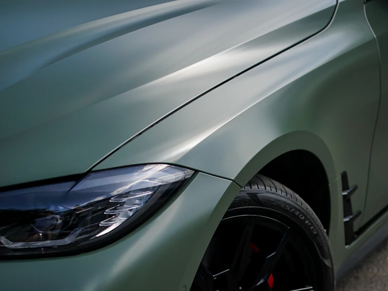 BMW i4 Satin Military Green Vinyl Wrap — photo 2 — Hussle Customz Los Angeles