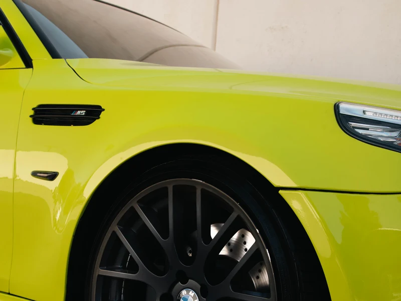 BMW M5 Super Gloss Racing Yellow Vinyl Wrap, Black PPF — photo 3 — Hussle Customz Los Angeles