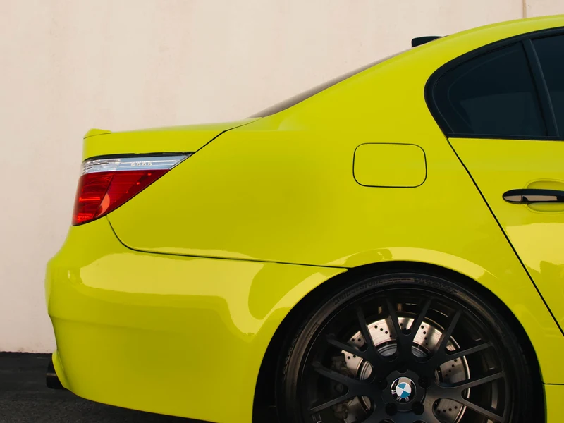 BMW M5 Super Gloss Racing Yellow Vinyl Wrap, Black PPF — photo 4 — Hussle Customz Los Angeles