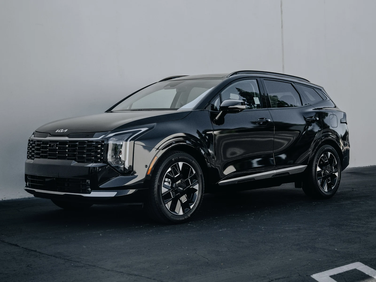 Kia Sportage Gloss Black Vinyl Wrap — photo 1 — Hussle Customz Los Angeles