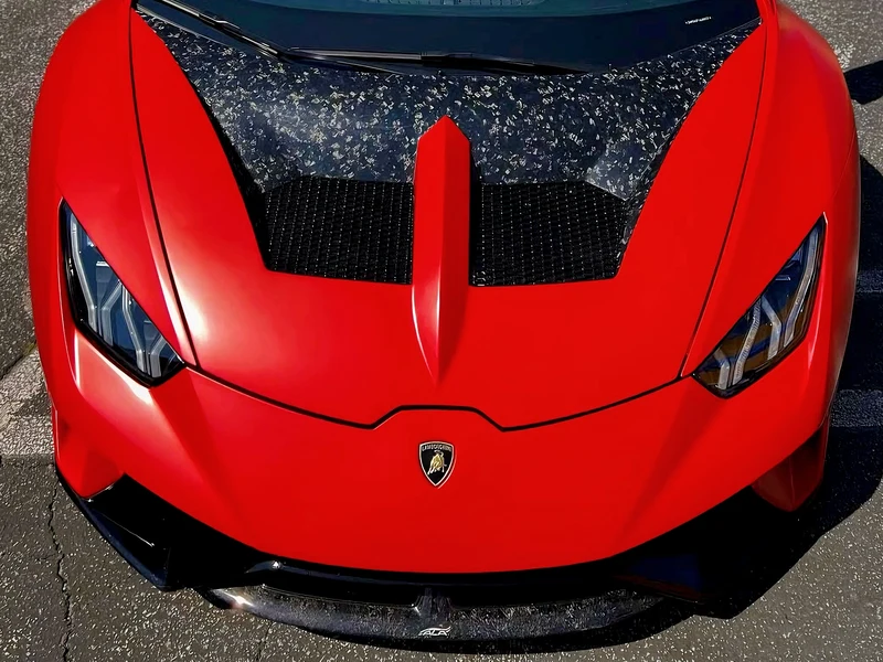 Lamborghini Huracan Satin Smoldering Red Vinyl Wrap — photo 2 — Hussle Customz Los Angeles