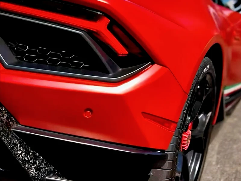 Lamborghini Huracan Satin Smoldering Red Vinyl Wrap — photo 3 — Hussle Customz Los Angeles