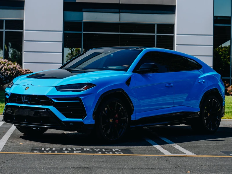 Lamborghini Urus Gloss Baby Blue Vinyl Wrap — photo 1 — Hussle Customz Los Angeles