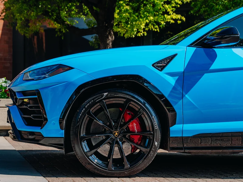 Lamborghini Urus Gloss Baby Blue Vinyl Wrap — photo 2 — Hussle Customz Los Angeles