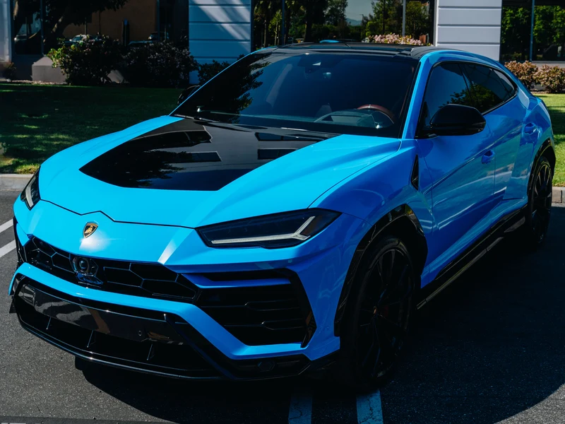 Lamborghini Urus Gloss Baby Blue Vinyl Wrap — photo 5 — Hussle Customz Los Angeles