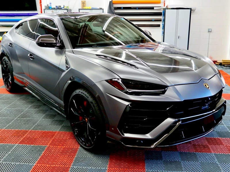 Lamborghini Urus Gloss Dark Grey Vinyl Wrap — photo 1 — Hussle Customz Los Angeles