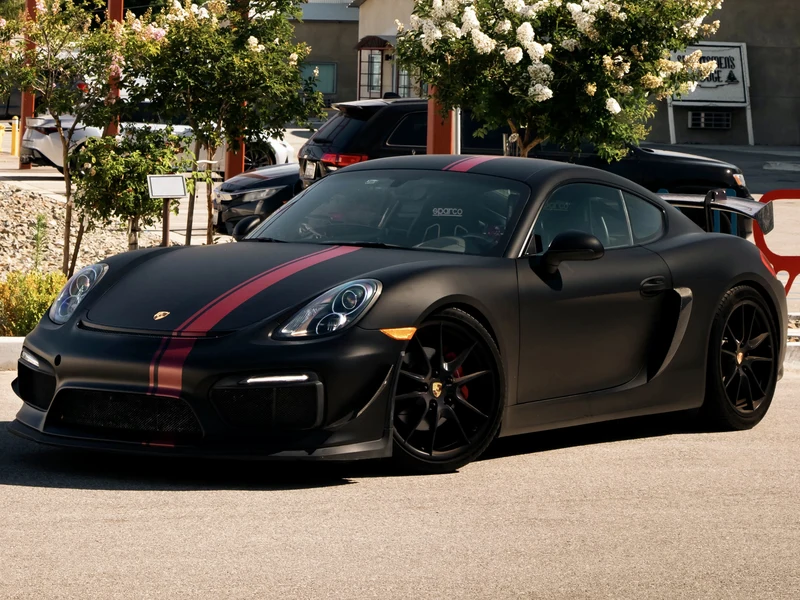 Porsche Cayman Matte Black and Satin Red Stripes — car wrap Los Angeles — Hussle Customz