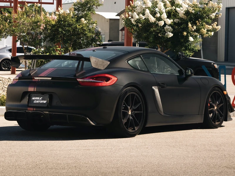 Porsche Cayman Matte Black and Satin Red Stripes — photo 4 — Hussle Customz Los Angeles