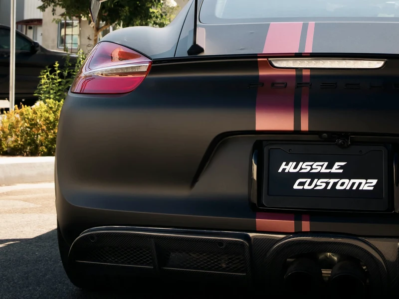 Porsche Cayman Matte Black and Satin Red Stripes — photo 5 — Hussle Customz Los Angeles