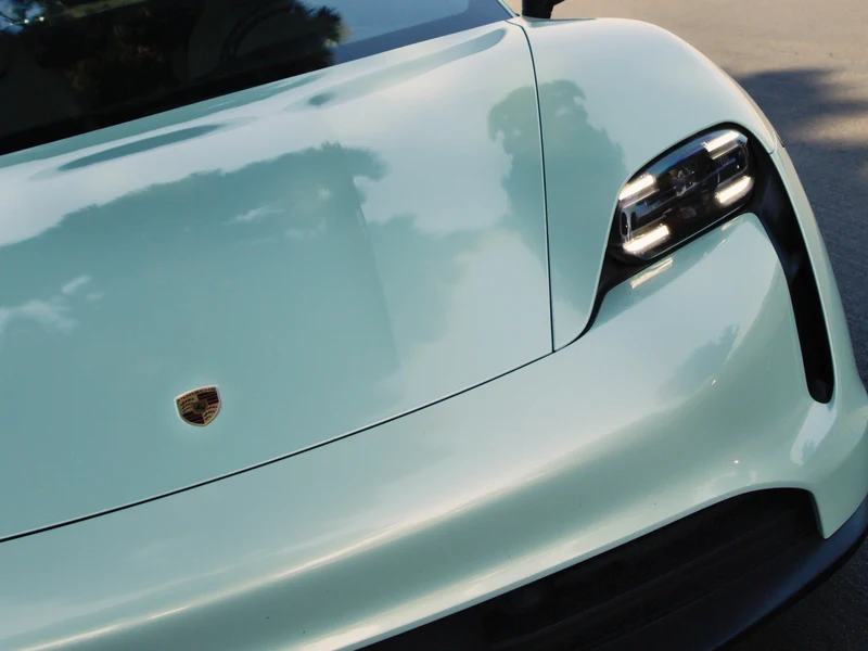 Porsche Taycan Super Gloss Mint Vinyl Wrap — photo 2 — Hussle Customz Los Angeles