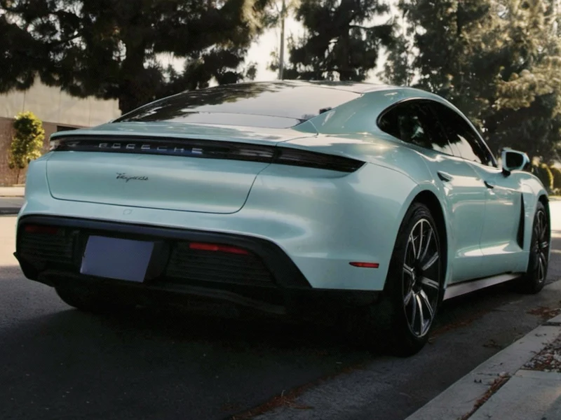 Porsche Taycan Super Gloss Mint Vinyl Wrap — photo 3 — Hussle Customz Los Angeles
