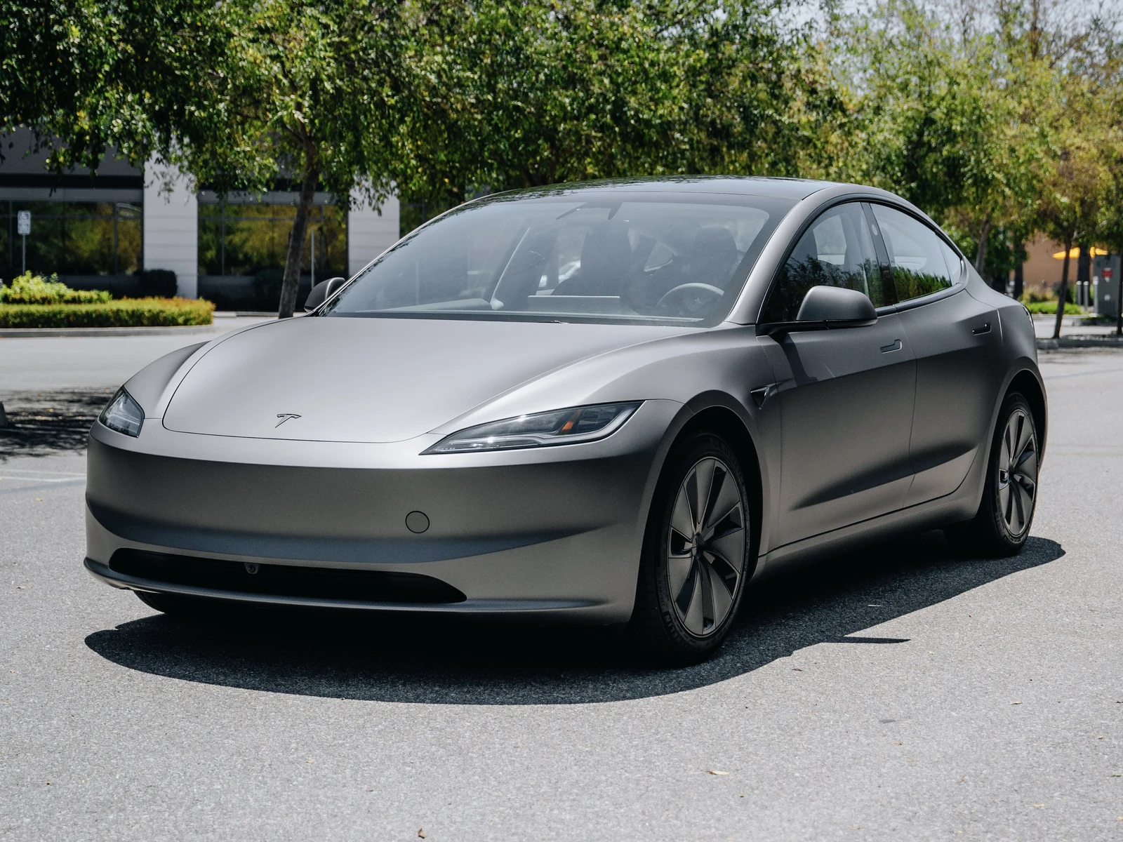 Tesla Model 3 Highland Matte Charcoal Metallic Vinyl Wrap — photo 1 — Hussle Customz Los Angeles