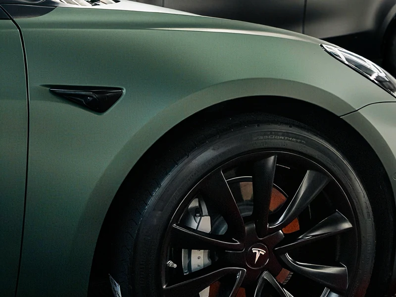 Tesla Model 3 Matte Pine Green Metallic Vinyl Wrap — photo 4 — Hussle Customz Los Angeles