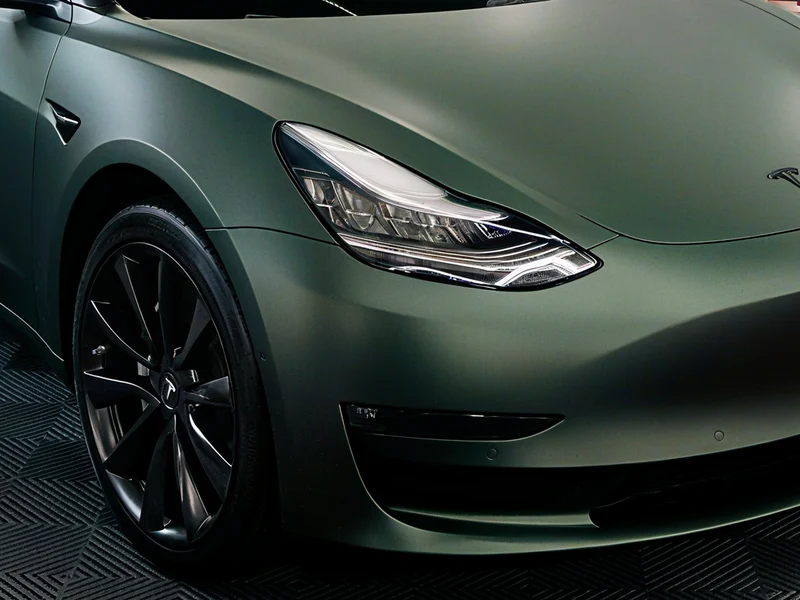 Tesla Model 3 Matte Pine Green Metallic Vinyl Wrap — photo 5 — Hussle Customz Los Angeles