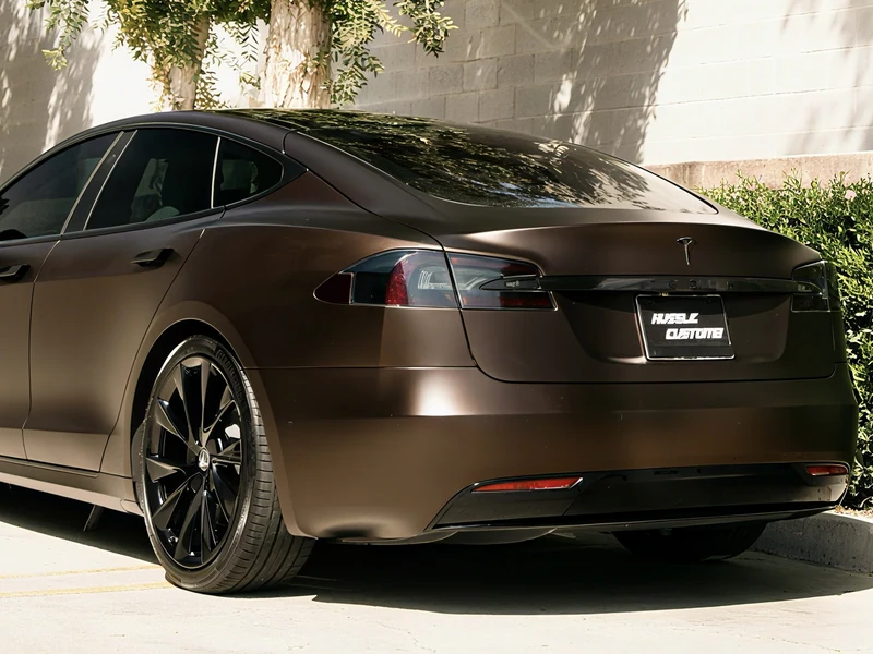 Tesla Model S with gloss black powder coated wheels and brown metallic wrap — powder coat color options — Hussle Customz Los Angeles