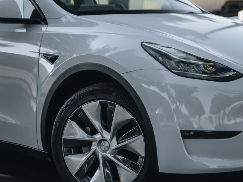 Tesla Model Y Gloss Cloudy Blue Vinyl Wrap — photo 2 — Hussle Customz Los Angeles