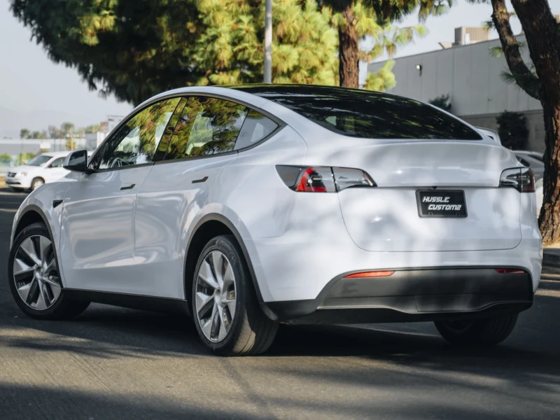 Tesla Model Y Gloss Cloudy Blue Vinyl Wrap — photo 3 — Hussle Customz Los Angeles