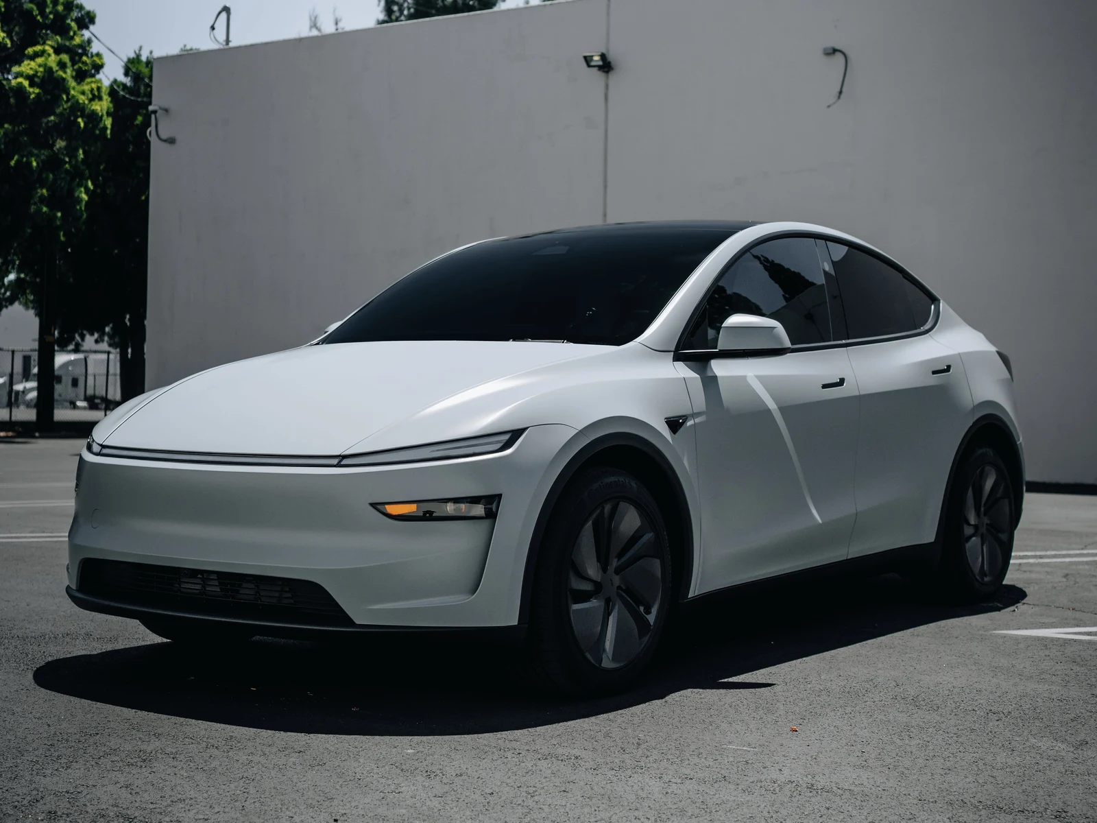 Tesla Model Y Juniper Satin Battleship Grey Vinyl Wrap — photo 1 — Hussle Customz Los Angeles