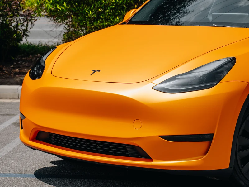 Tesla Model Y Matte Stunning Orange PPF — photo 2 — Hussle Customz Los Angeles
