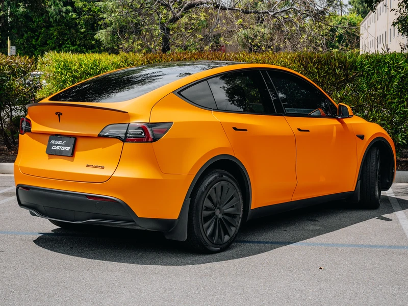 Tesla Model Y Matte Stunning Orange PPF — photo 3 — Hussle Customz Los Angeles
