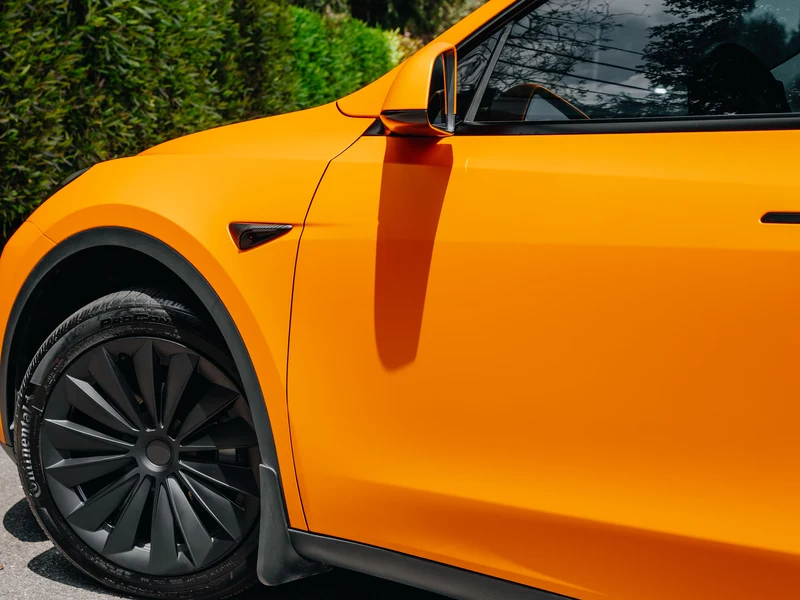 Tesla Model Y Matte Stunning Orange PPF — photo 4 — Hussle Customz Los Angeles
